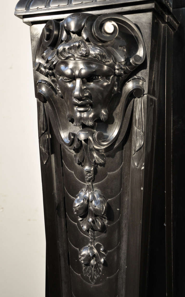 Neo Renaissance style antique fireplace with Satyrs in Black Belgium marble, 19th century In Good Condition In Saint Ouen, FR