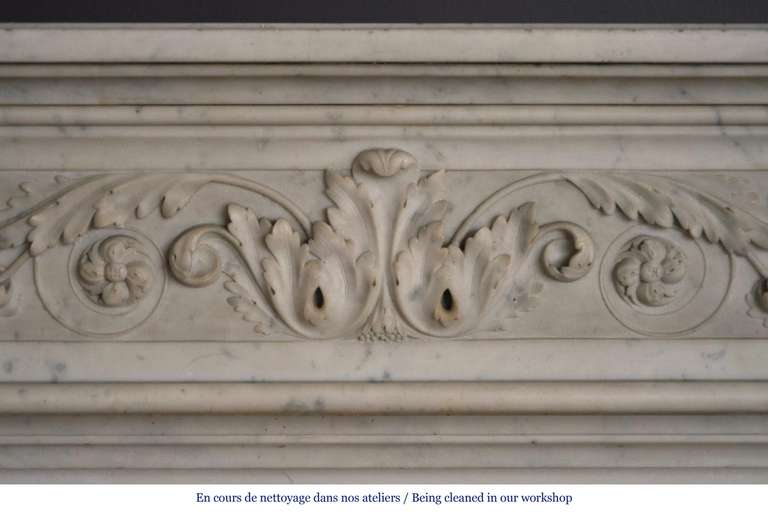 The frieze is delicately carved with fine foliages and acanthus leaves. Curved jambs are ornated with raw of pearls and oak leaves.
This fireplace is sold with an old cast iron insert but without the curtain.