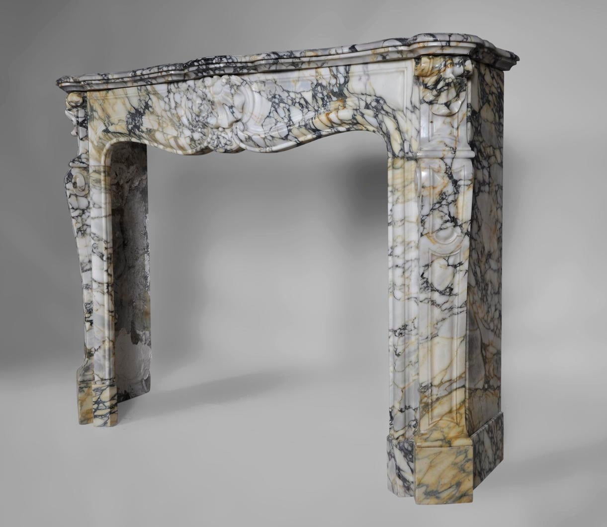Breccia Marble Louis XV Style Fireplace Sculpted in Breche Marble, 19th Century Period