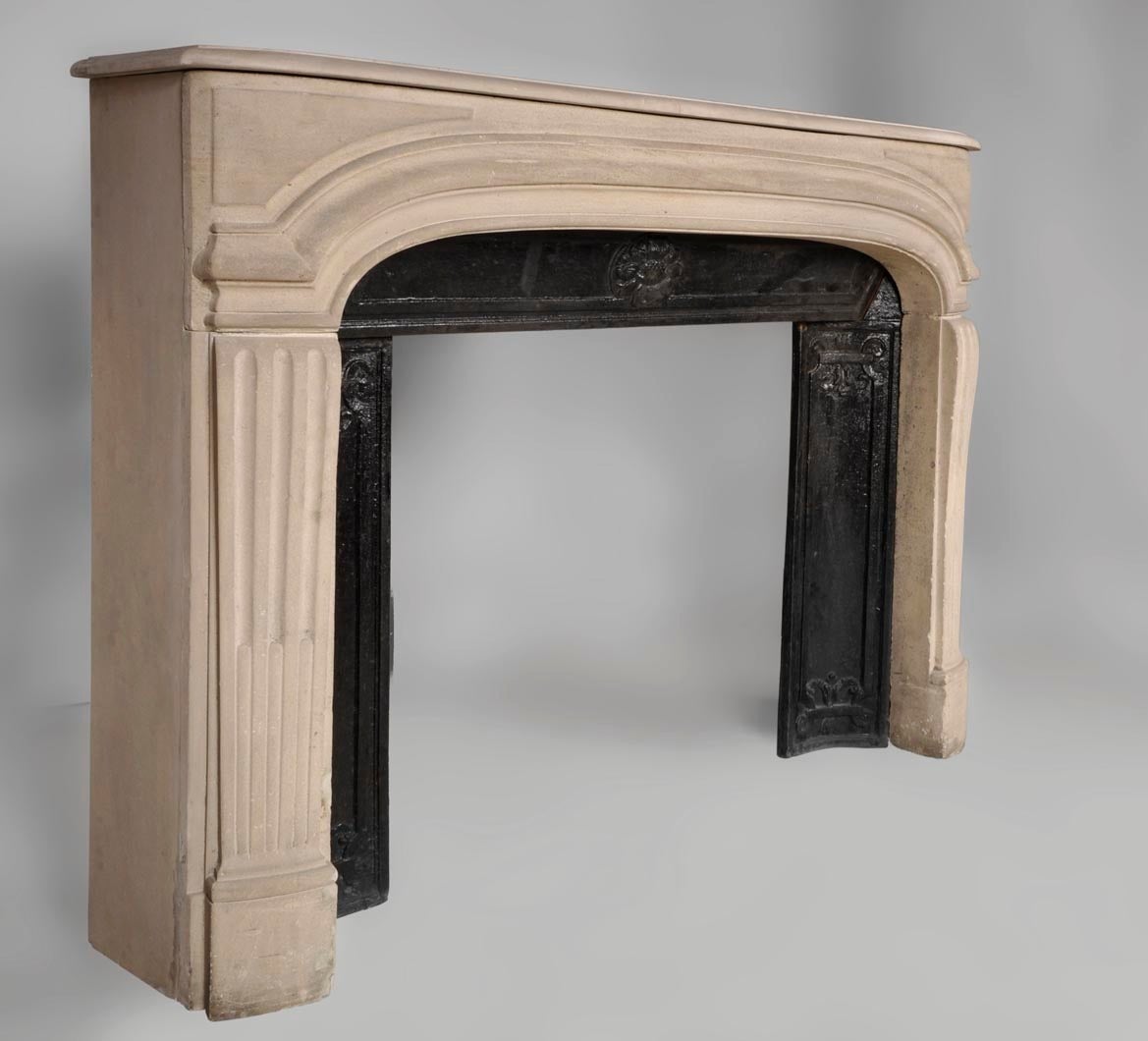 This fireplace comes with its original cast iron insert made in three parts.
