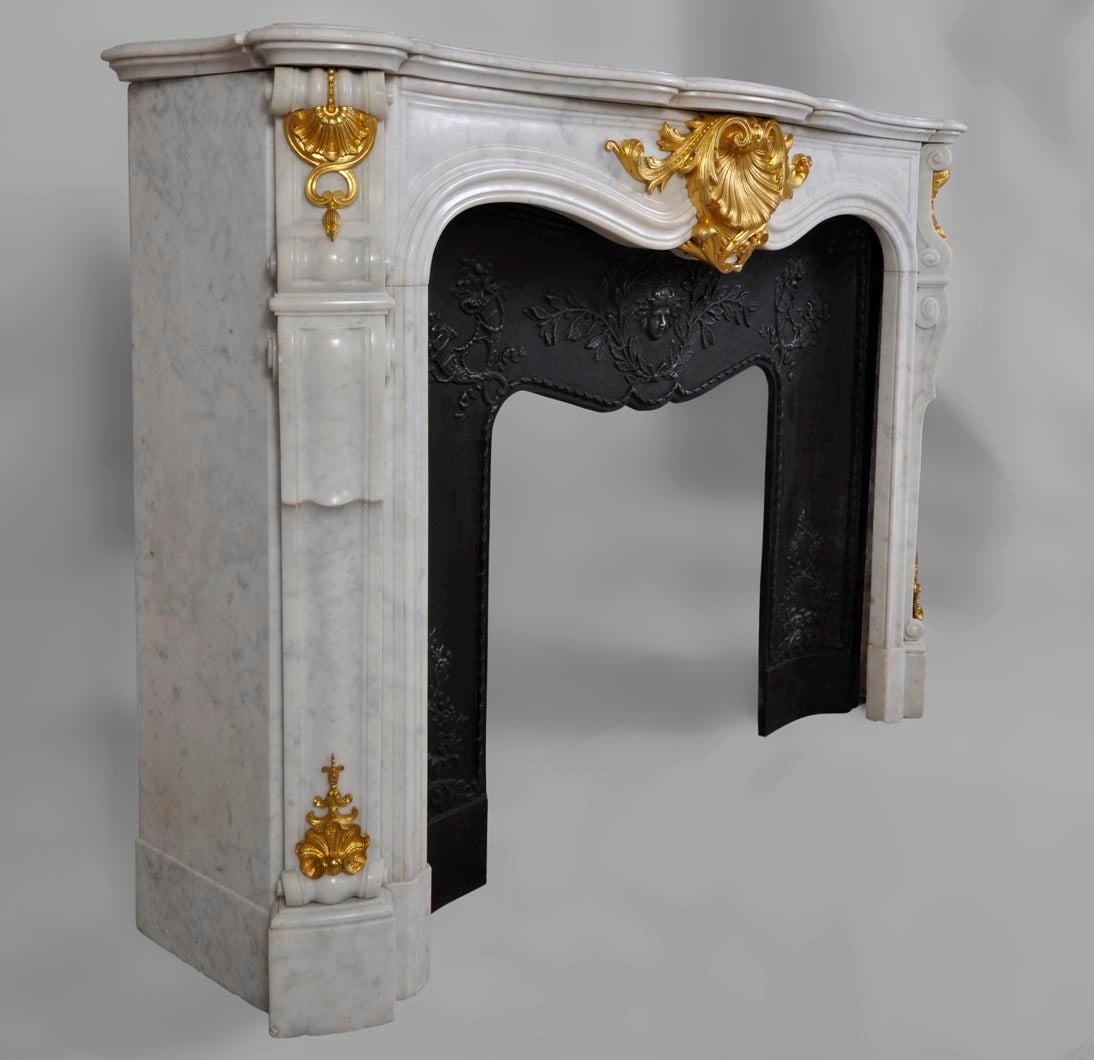 French Louis XV Style White Carrara Marble Fireplace with Gilded Bronze Ornaments