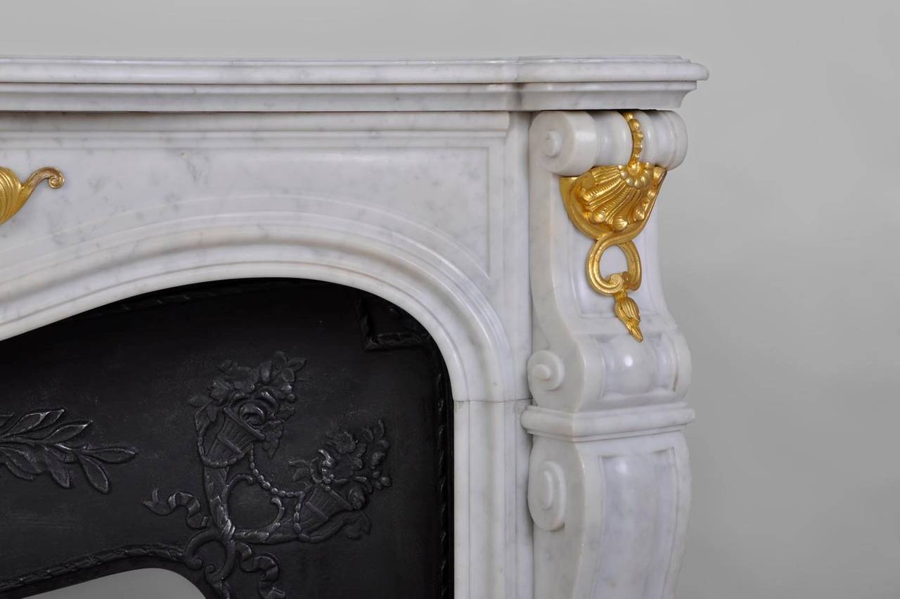 Louis XV Style White Carrara Marble Fireplace with Gilded Bronze Ornaments 1