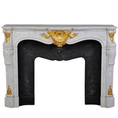 Louis XV Style White Carrara Marble Fireplace with Gilded Bronze Ornaments
