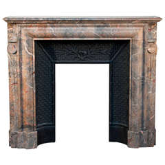 Antique Louis XIV style fireplace made out of Rose Enjugerais marble