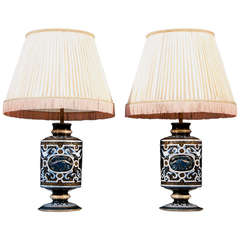 Pair of Neo-Renaissance style lamps by Edouard Dammouse, signed and dated 1885