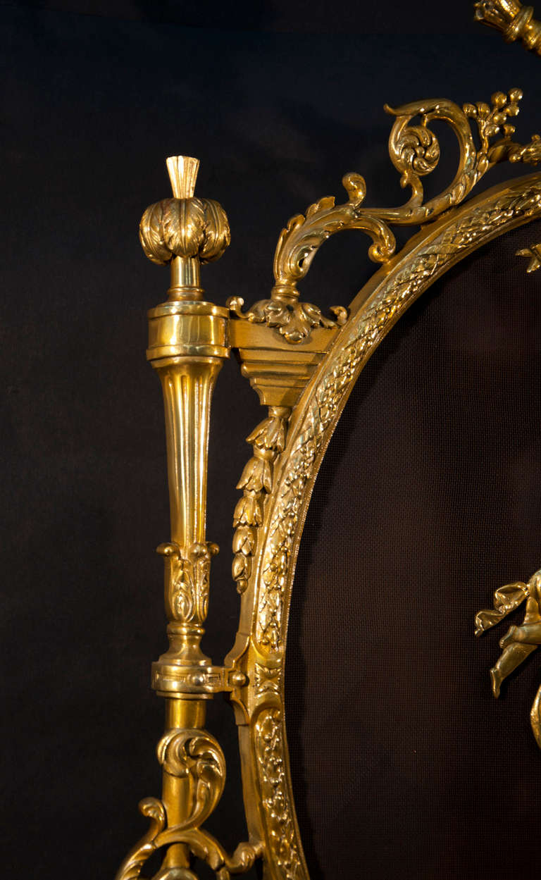19th Century Louis XVI style gilded bronze fire screen made by Charles Casier, 19th c.