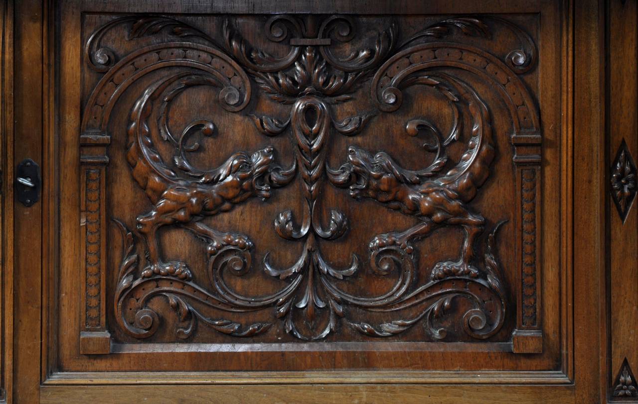 Walnut BELLANGER, cabinetmaker : Neo-Renaissance style cabinet with chimeras decor For Sale