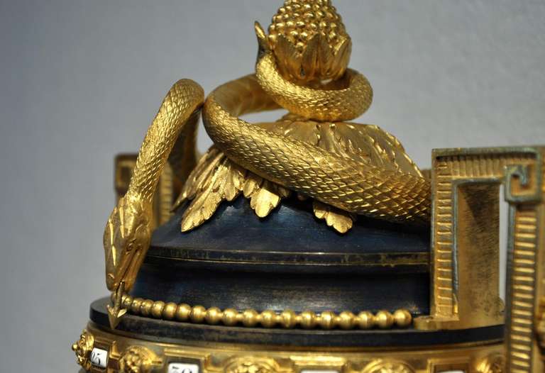 Exceptional Antique Clock with Snakes and Rotary Dials at 1stdibs