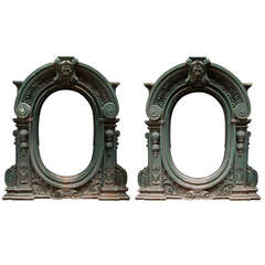 Pair of cast iron attic windows with Satyrs heads decoration