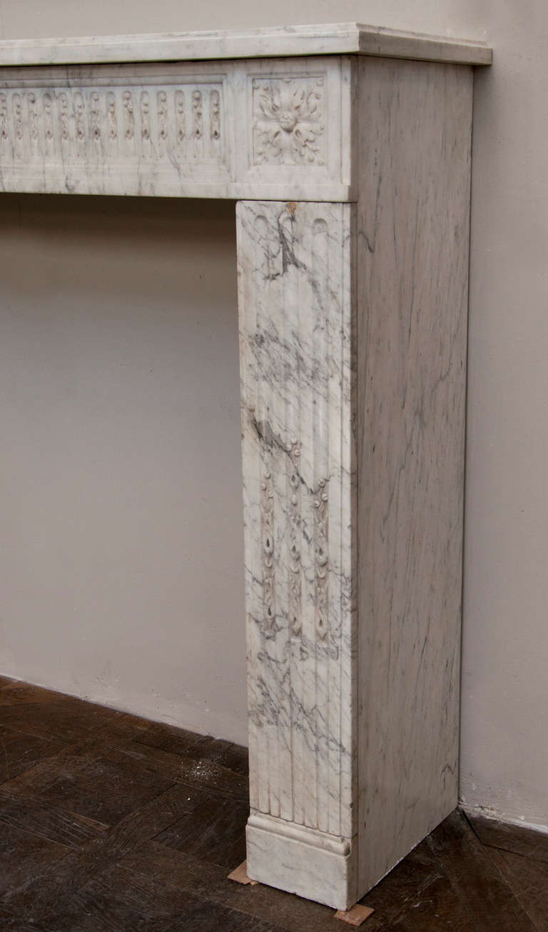 Marble Antique Louis XVI period fireplace made out of Carrara marble, 18th c.