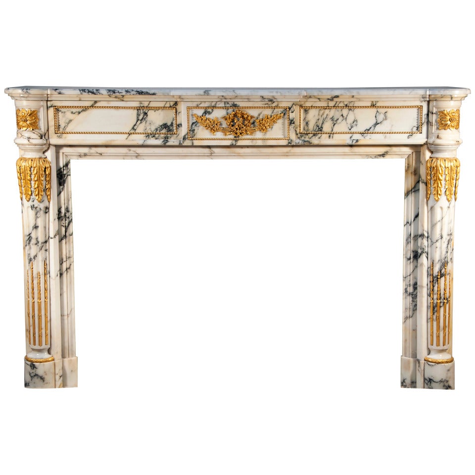 Rare Antique Louis XVI Style Fireplace with Columns and Gilded Bronze Sculptures For Sale