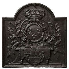 Antique cast iron fireback from the 18th c. with the coat of arms of Paris