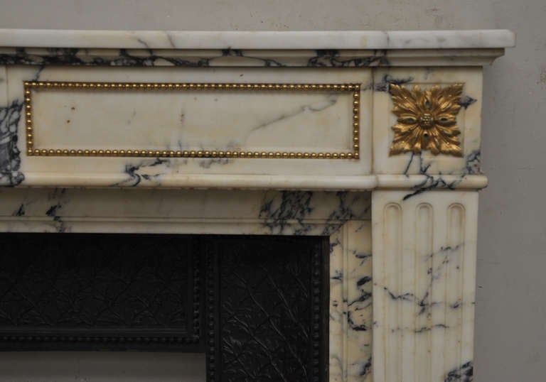 Louis XVI style antique fireplace in Panazeau marble and bronze 1