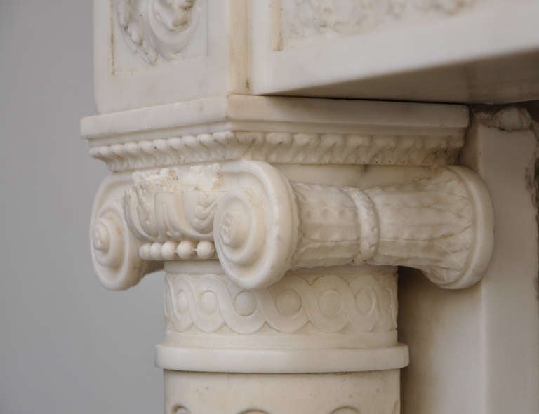 Marble Antique Louis XVI style fireplace with detached columns, 19th c.