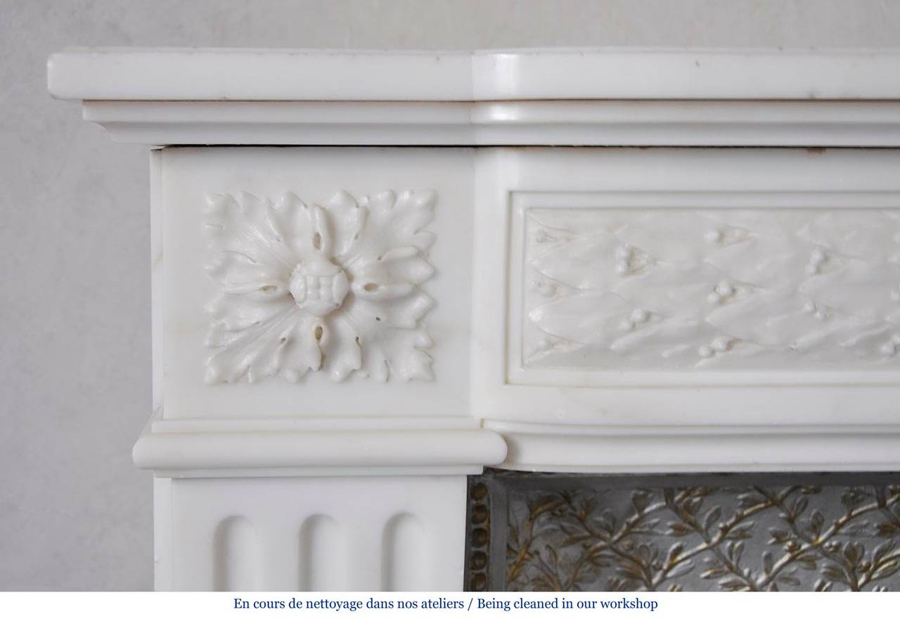 Carved Antique Louis XVI Style Fireplace in Statuary Carrara Marble, 19th Century