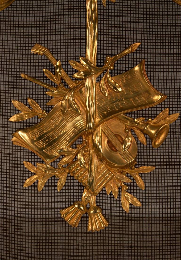 Louis XVI style fire screen in gilded bronze, 19th c.