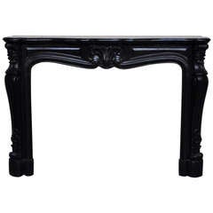 Beautiful Antique Louis XV Style Fireplace in a Rare Black from Belgium Marble, 19th Century