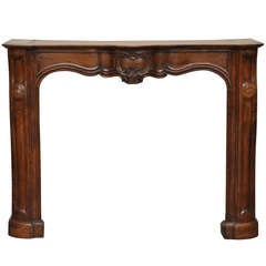 Antique Louis XV Period Fireplace Made Out of Walnut Wood from Lyon, 18th Century