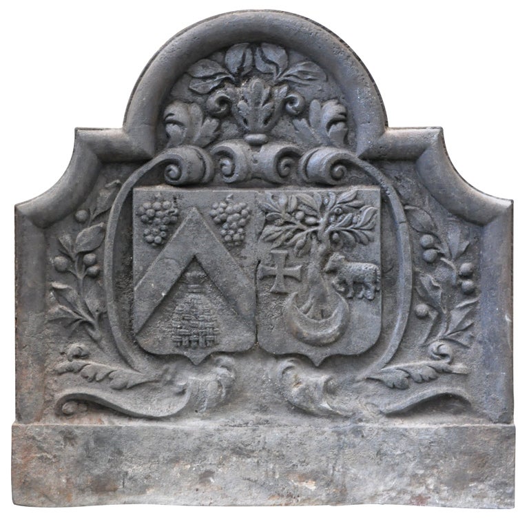 Cast iron fireback from the 18th century with coat of arms