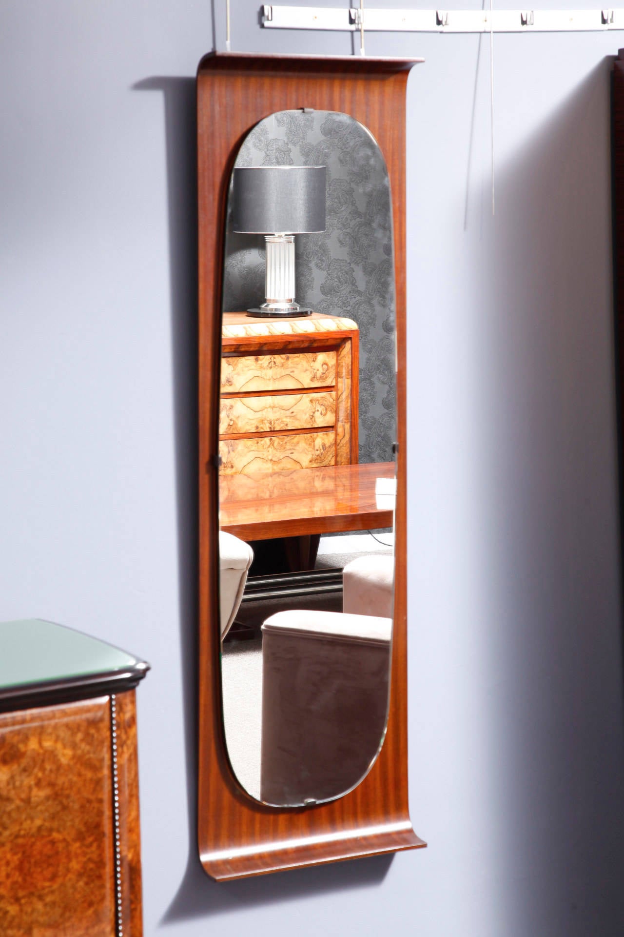 Mahogany tinted plywood mirror from 1950, Italian origin. The wood was re polished with a handmade French polish.