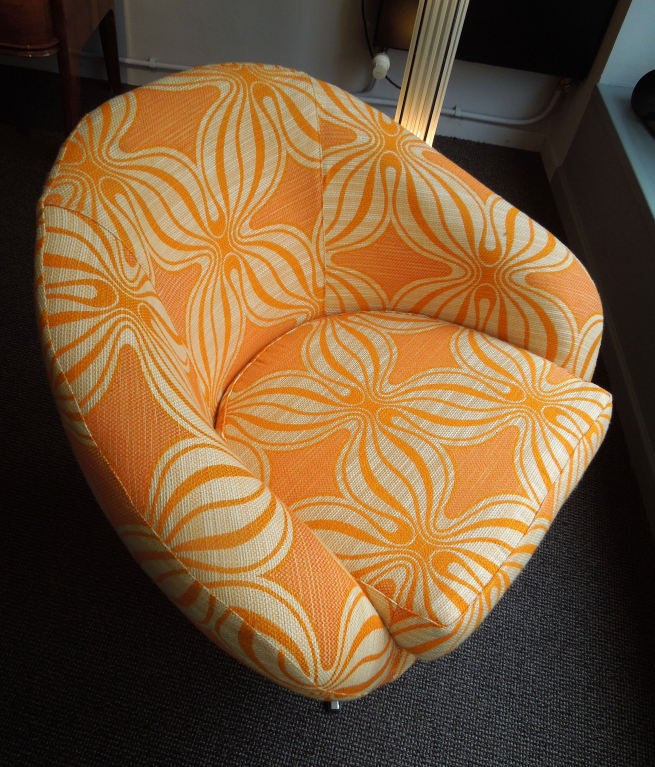Italian origin chair, reupholstered with an original 70's, very nice orange coloured and geometric shaped fabric.