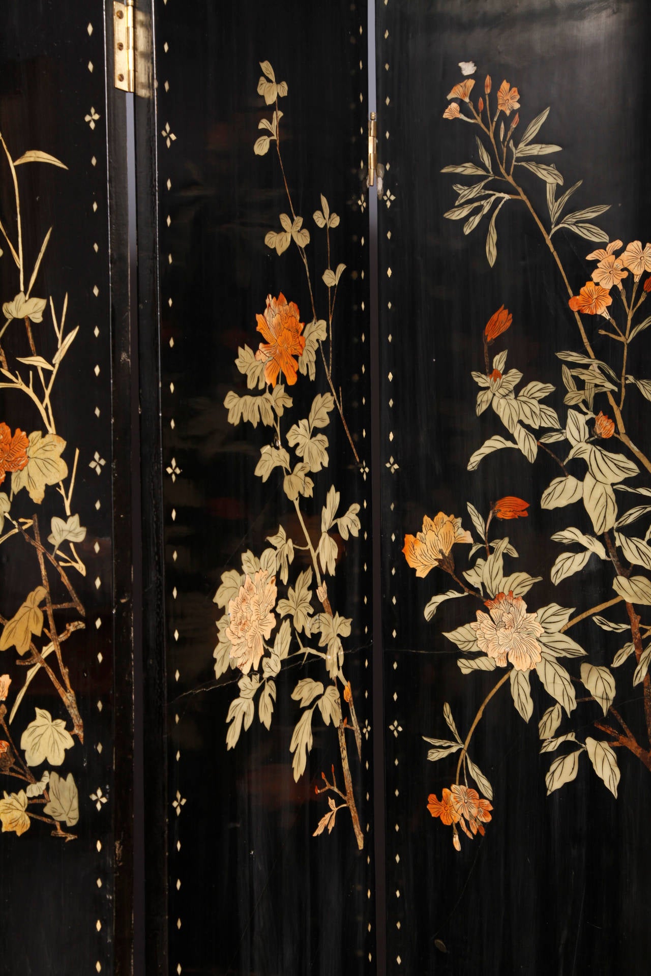 A very elegant four-panel Chinese folding lacquered screen from late 19 th century.On each side a different motive, simply beautiful.
 Each panel makes 16,9 inches wide on 72 inches high.