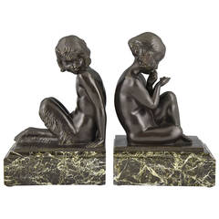 Art Deco Bronze Buchstützen mit Satyr und Mädchen von Pierre Laurel:: 1930