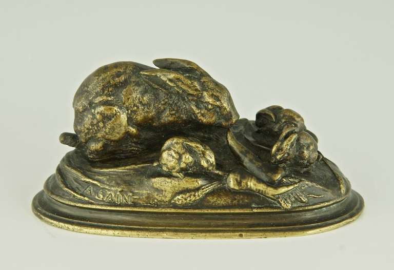 A bronze sculpture of a rabbit with 3 baby rabbits by August Nicolas Cain.  France (1822-1894)
Signature: Cain. 
Style:  Romantic. 		
Date:  1875.			
Material: Bronze. 	
Origin:  France. 			
Size of one:			
 H. 5.5 cm  x L. 11.5 cm. x W. 5.5