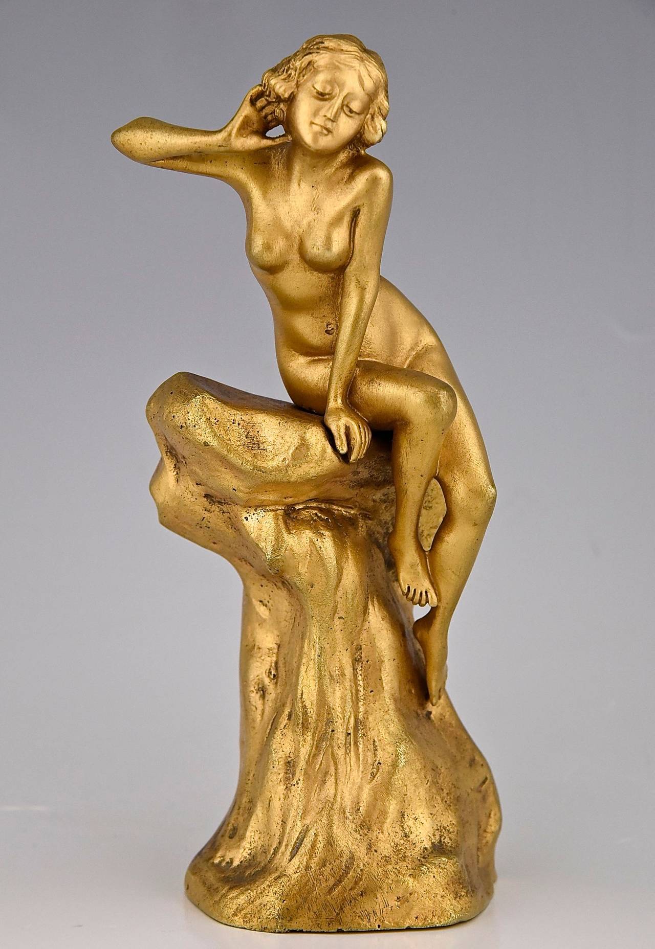 Art Nouveau gilt bronze nude on a tree trunk.
Artist:  Affortunato Gory.
Signature:  A. Gori.
Style:  Art Nouveau.
Date:  1910. 
Material:  Gilt bronze  .
Origin:  France. 
Size:
 H. 7.9 inch x L. 2.6 inch x W. 3.5 inch. 
H. 20 cm. x L. 6.5