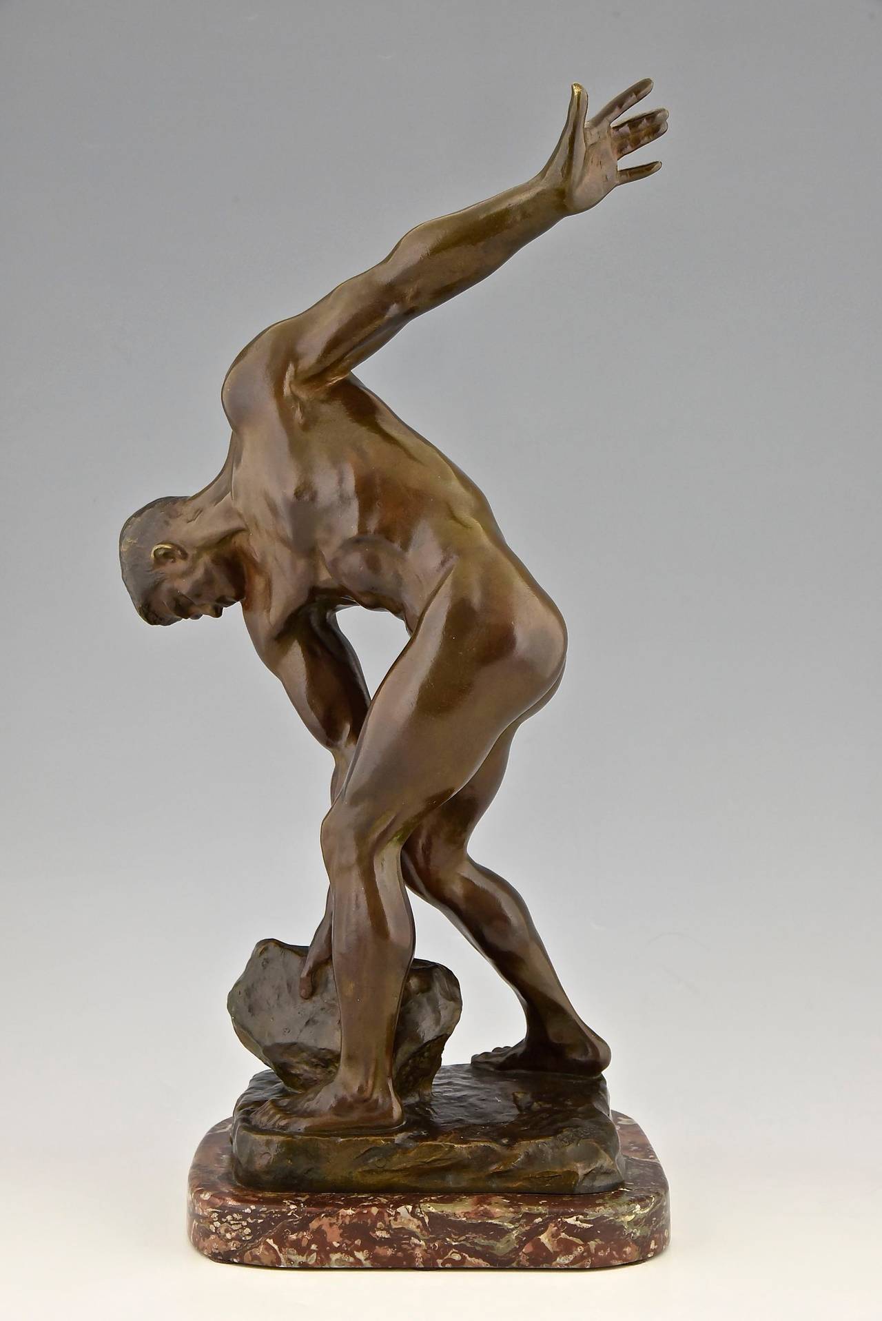 Antique sculpture of a male nude with rock. 
By Henri Greber (1855-1941)
Signature:  Greber
Date:  1900.	
Material: Bronze on marble base. 
Origin:  France.			
Size:			
H. 23.8 inch x L. 11 inch x W. 9.5 inch. 
 H. 60.5 cm. x L. 28 cm. x W.