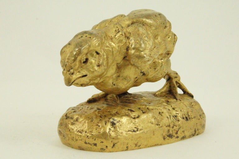 Gilt bronze sculpture of a running chick by the french artist Clovis C. Masson. 
Clovis Masson studied under Bayre, born in 1838, died in 1913.

The bronze is signed, numbered and bears the foundry mark of E. Douillet ed.

Literature:
“The