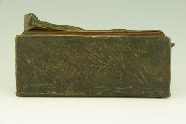 An Art Nouveau Vienna Bronze Stationary Rack By C. Philipp