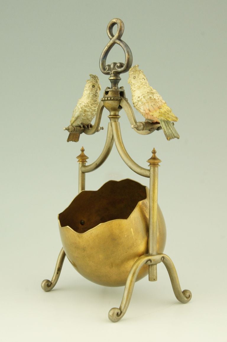 Vienna bronze bonbonniere with two parrots on a swing.