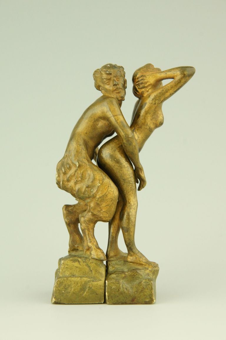 A pair erotic Vienna bronzes, nymph and satyr by one of the ateliers of the Vienna bronzes. 
Both have a stamped number 1433. 
The nymph is also stamped 3. 

H 3.5 inch x L. 2,2 inch (together) x W. 1.6 inch.  

This model is illustrated on