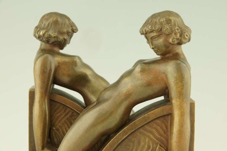 A pair of Art Deco bookends with nudes by F. Bazin 1