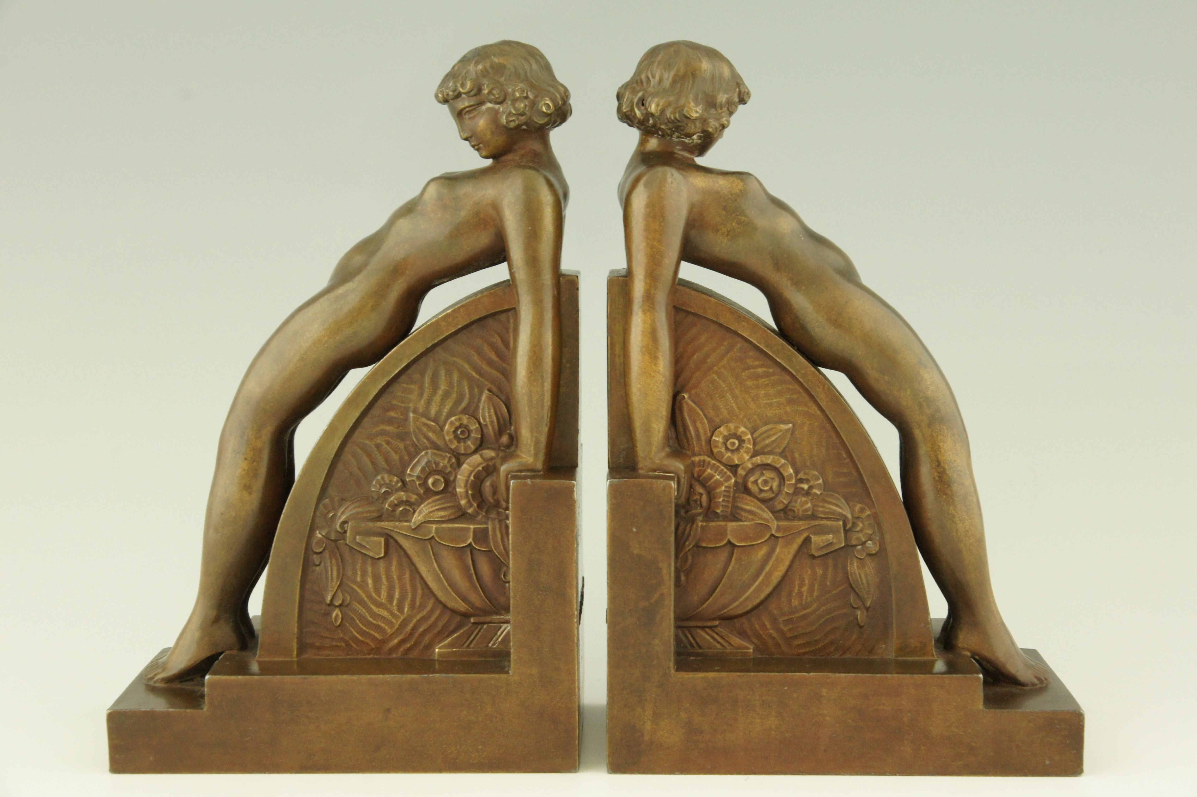 A pair of Art Deco bookends with nudes by F. Bazin
