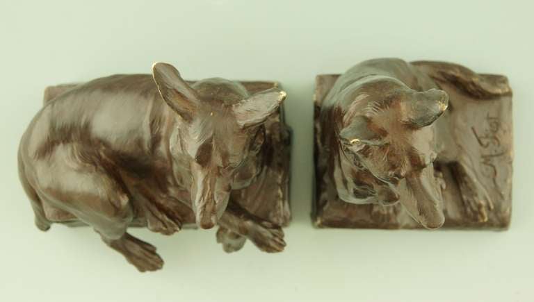 20th Century A pair of bronze shepherd dog bookends by Maximilien Fiot, France.
