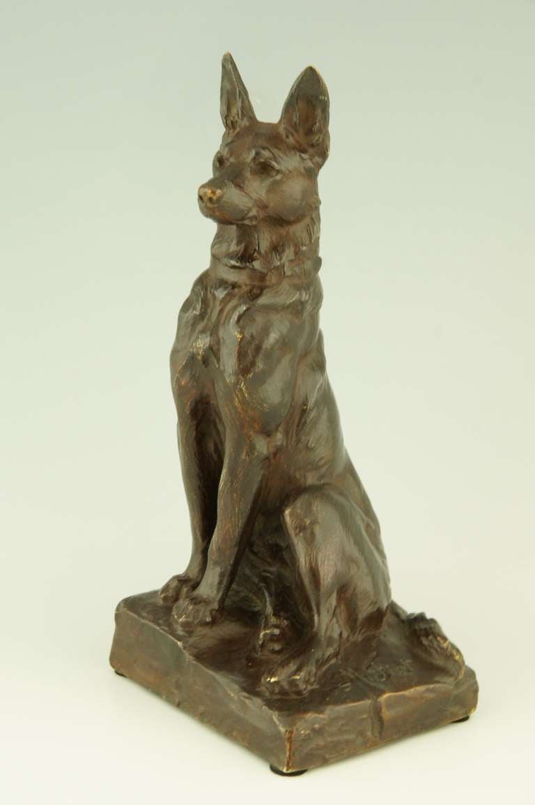 Bronze A pair of bronze shepherd dog bookends by Maximilien Fiot, France. 
