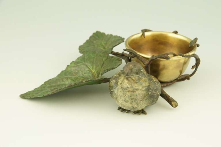 Austrian A cold painted Vienna bronze tray with a bird on a branch with leaves.