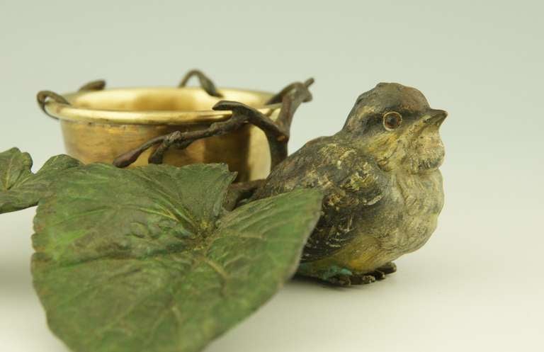 A cold painted Vienna bronze tray with a bird on a branch with leaves. 1
