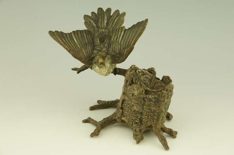Vienna bronze inkwell with a bird perched on a tree stump.
Attributed to Franz Bergman.

 A similar model is shown on page 253 of 
“Antique Vienna bronzes“  by Joseph Zobel. Schiffer.
 “Bronzes de Vienne” by Ernest Hrabalek, les editions de