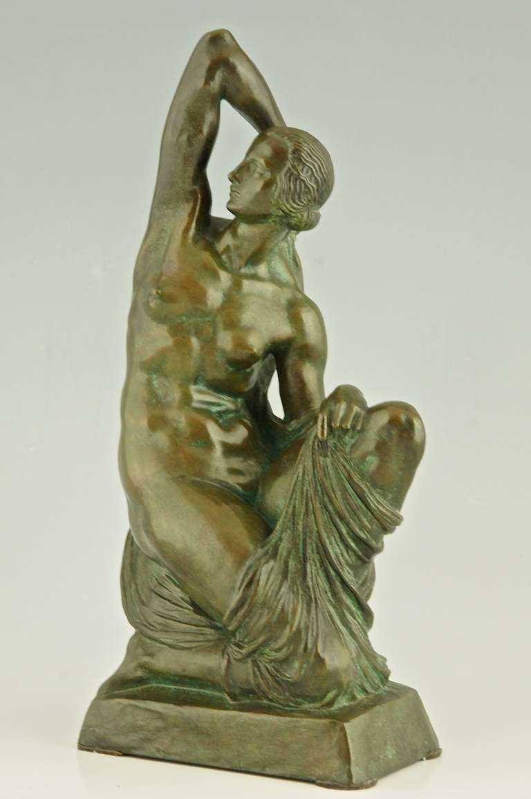 Art Deco bronze sculpture of a nude.
By Joe Descomps Cormier (1869-1950)

Signature / Marks:  J.D. Cormier . F. Barbedienne Fondeur
Style: Art Deco.
Condition:  Good original condition. 
Date:  Ca. 1925.
Material: Bronze. 
Origin: France. 