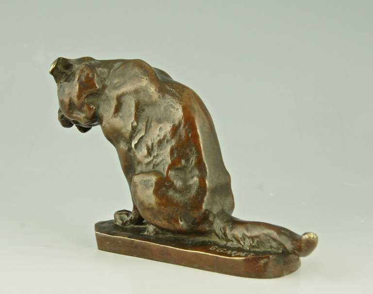 Antique bronze of a sitting cat.
By  Georges Gardet 1863-1939.  
Signature/ Marks:  G. Gardet.  220 D.  Founder Siot, Paris. 	 

Style:  Romantic. 		
Date:  1895.			
Material:  Bronze. 		
Origin:  France.  			

Size:			 
H. 9 cm  x L.14