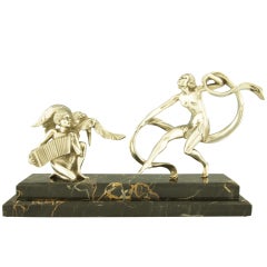 Art Deco silvered bronze dancer with musician by A. Soleau. 