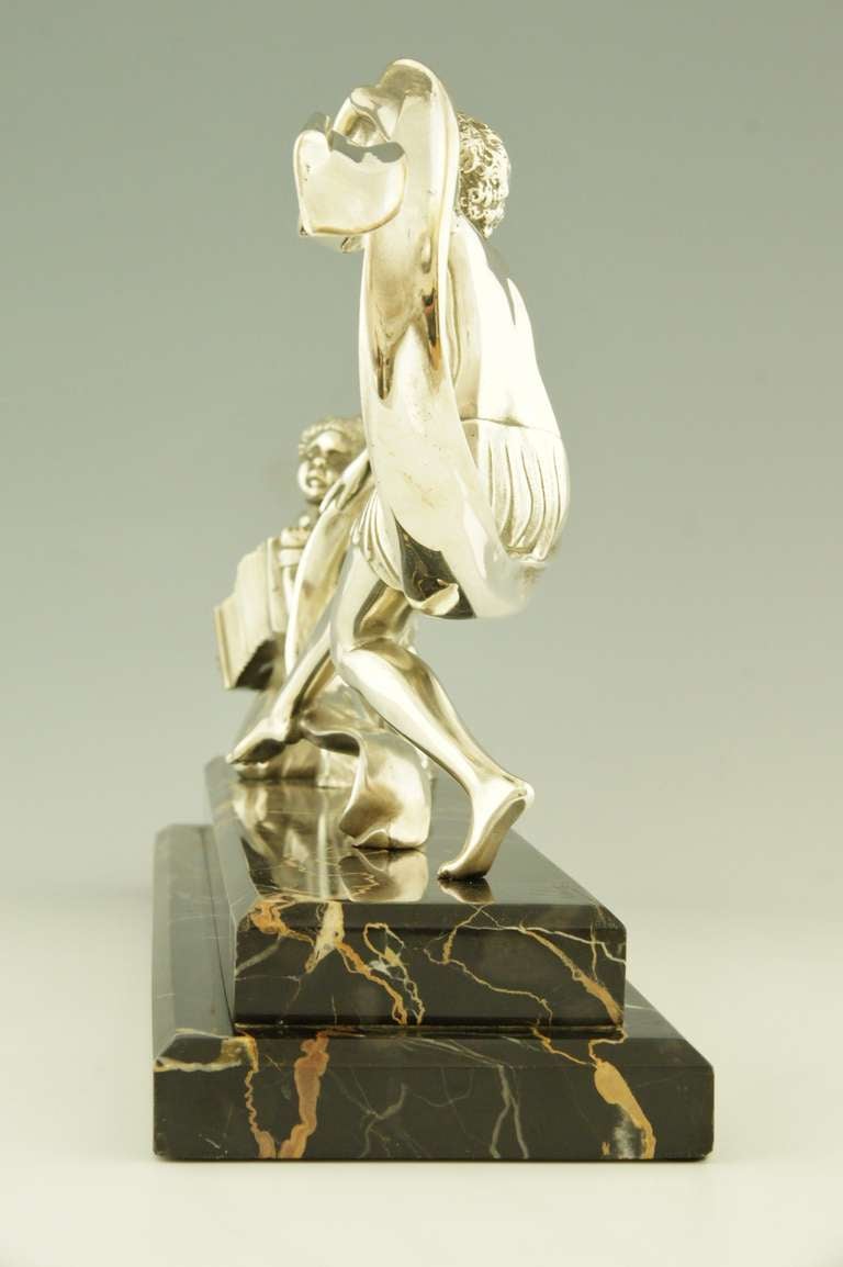 French Art Deco silvered bronze dancer with musician by A. Soleau. 