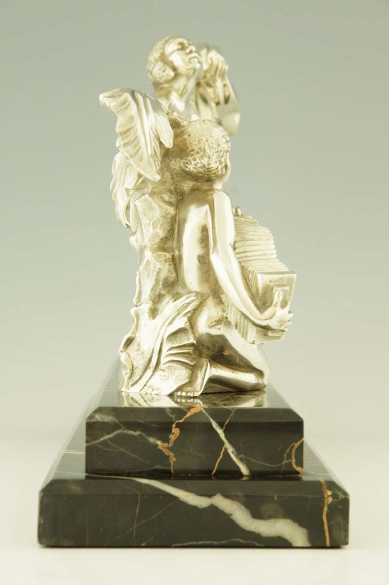 Mid-20th Century Art Deco silvered bronze dancer with musician by A. Soleau. 