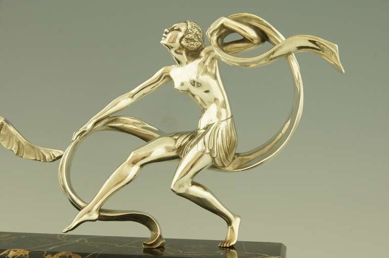 Art Deco silvered bronze dancer with musician by A. Soleau.  1