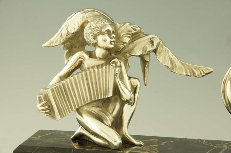 Art Deco silvered bronze dancer with musician by A. Soleau.  2