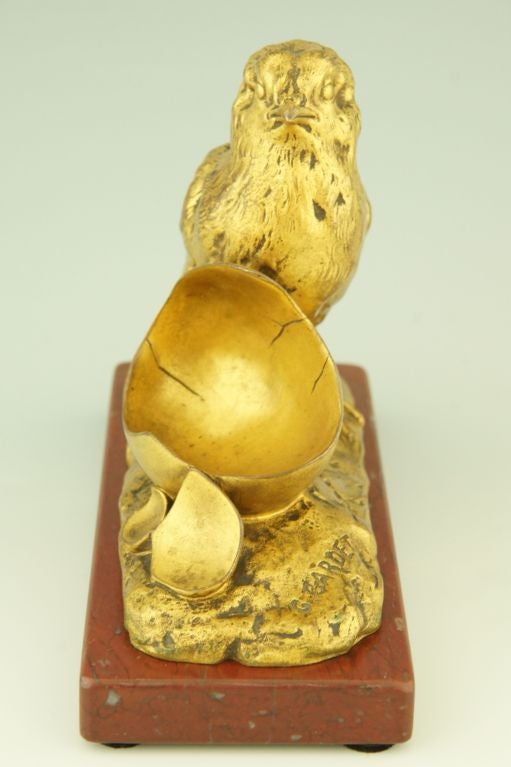 Fedex priority shipping: $ 125.

Gilt bronze chick with eggshell by Georges Gardet with F. Barbedienne foundry mark. 

 You will find an illustartion of this bronze “The chicken and the egg,” on page 85 of
“Animals in bronze” by Christopher