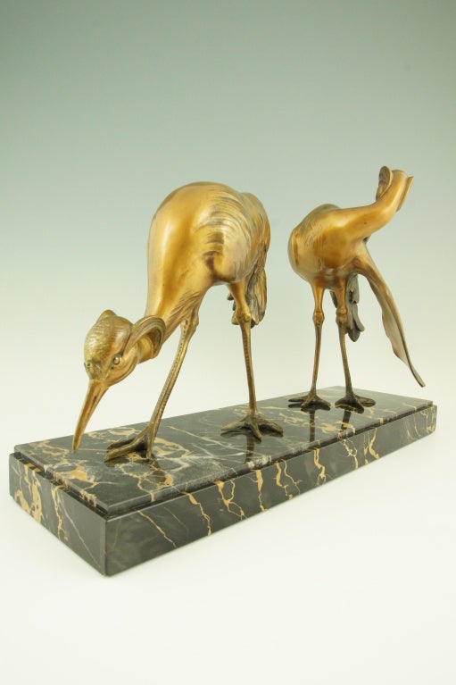 Bronze crane birds with beautiful multi color patina by G.H. Laurent. 
Marked bronze véritable and Edition Reveyrolis, Paris. 

Fedex shipping: $ 375

“Art deco and other figures” by Brian Catley, Antique collectors club.
“Animals in bronze”